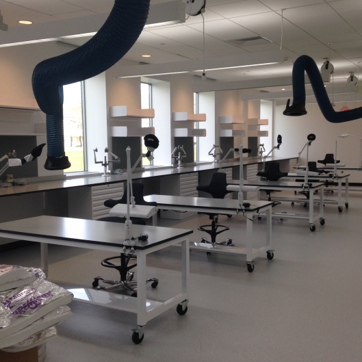 main conservation treatment space, with mobile tables and fume extractor arms
